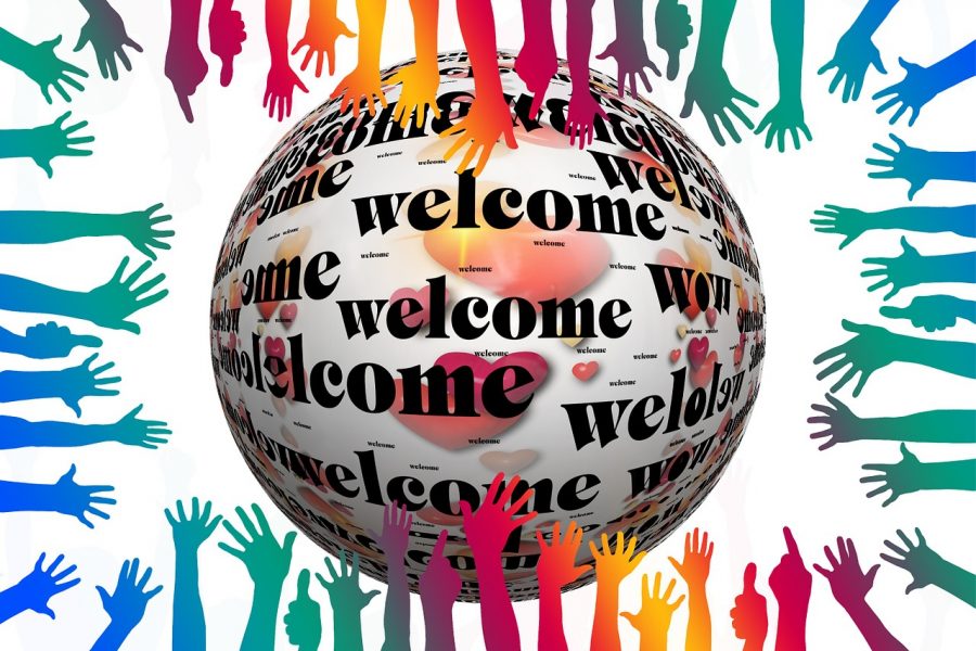 Hände und Schriftzug Welcome