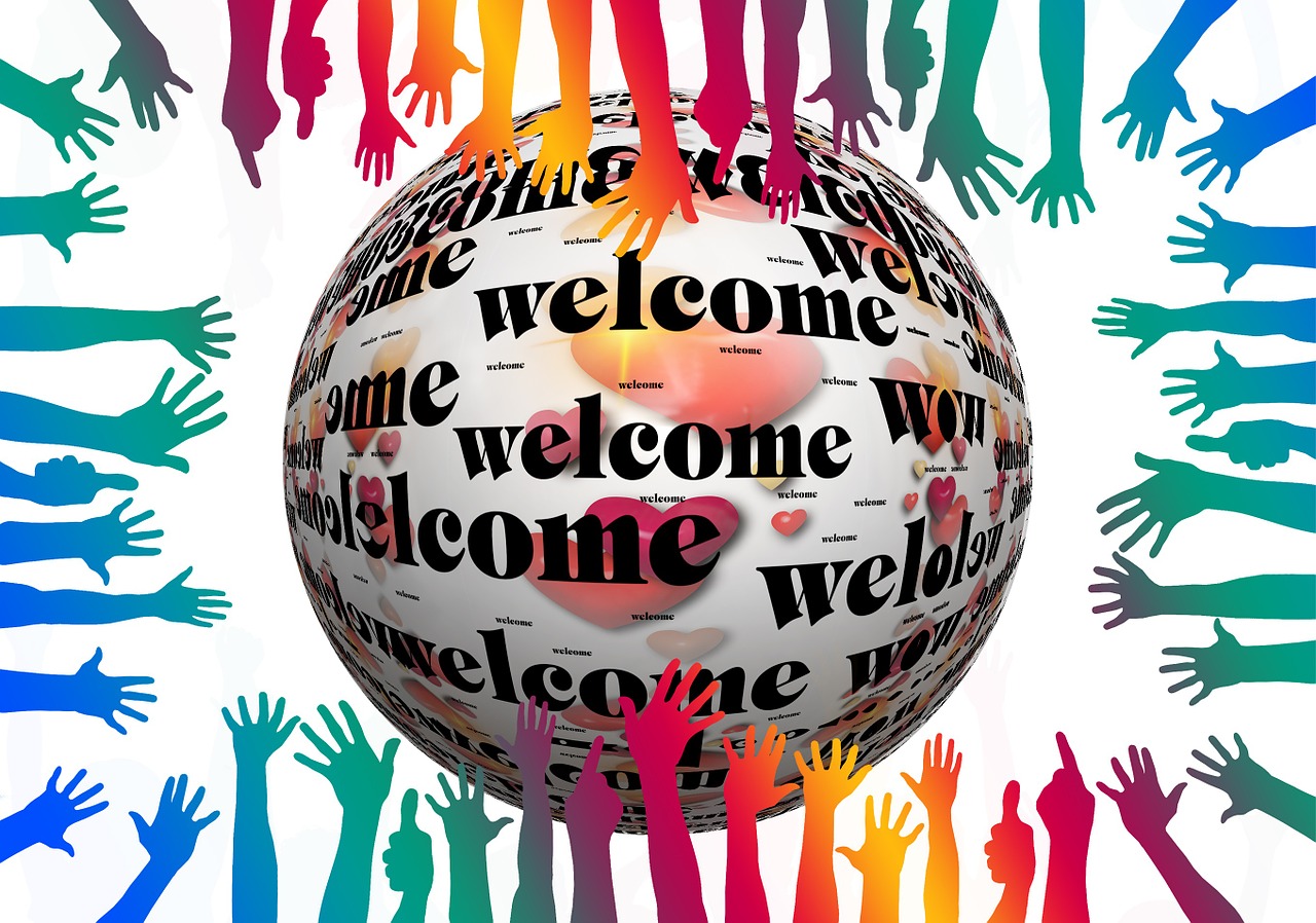 Hände und Schriftzug Welcome