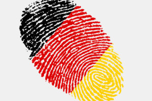 Fingerabdruck, der in den Farben Schwarz, Rot und Gold (deutsche Nationalfarben)